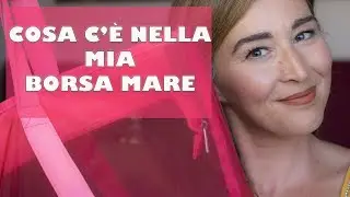 COSA C'&Egrave; NELLA MIA BORSA MARE...CON INTRUSO!! | LAURA ILMIOBEAUTY