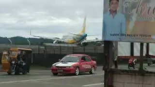 Airbus A320 Cebu Pacific Air Is Ready For Takeoff In Different Position (But A Bus Photobombs)