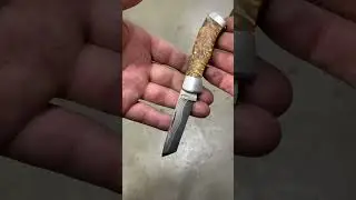 My first lockback.  In bulldog SanMai with wrought iron cladding.    Musk ox scales  Tanto blade.  