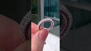 New Creation: Calibrated Emerald Cut Eternity Band featuring tapered rubies in hidden setting. It