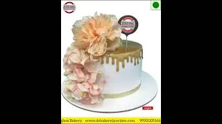 Golden gel dripping cake with big beautiful matching golden flowers, golden ribbon DBJ #goldencake