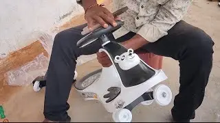 Unboxing and assembling of Toyzone panda Magic car, black and white | panda 🐼  swing car