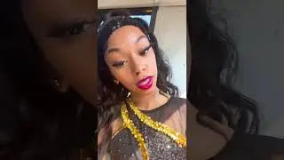 Glamorous Woman Poses and Smiles in Sparkling Outfit#sequinstyle #glamlook #sparkleoutfit