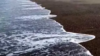 Waves crashing onto North Beach, Aberystwyth