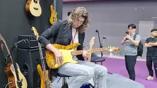 Guangzhou, music exhibition. Bullfighter unveils new D-190 guitar model