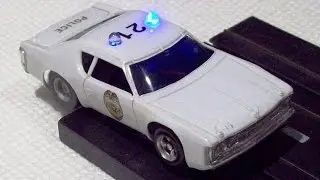 Custom Aurora AFX Matador Police Car with flashing LEDs