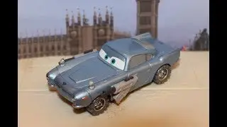 Mattel Disney Cars Spy Finn McMissile with Weapons & Magnetic Tires (Light & Sounds)