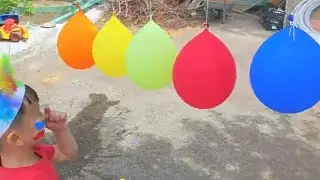 Fun outdoor game with balloons. Summer outdoor activities for kids. Why should children play outside