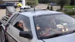 The BTTF car Delorean Time Machine with Mcfly driven by Tom Fletcher and Danny Jones