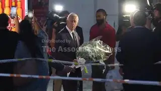 President, prime minister and mayor visit site of Lisbon streetcar crash to place flowers for victim