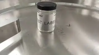 Auto sticker labeler fix position round jar wrap around labeling machine for special position