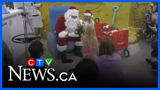 Santa visits Stollery Children's Hospital by helicopter