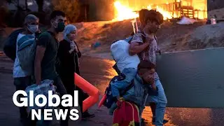 Thousands of migrants forced to flee after fire at Moria refugee camp in Greece
