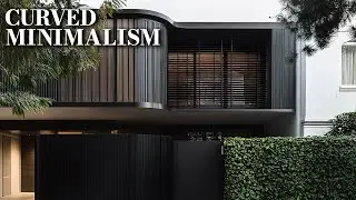 Curved Minimalist Luxury House Design with Vertical Louvers for Sun Control