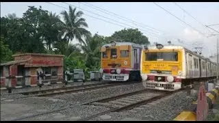 Crossing : Different Model EMU Local Trains at busy Railgate