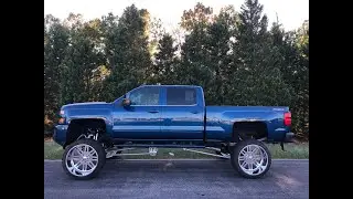 Lifted trucks for sale at dlux motorsports. POWERSTROKE, CUMMINS, DURAMAX DIESEL
