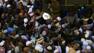 Kissing of Hajar Aswad (The Black Stone) in the Holy Grand Mosque of Masjidil Haram in Mecca
