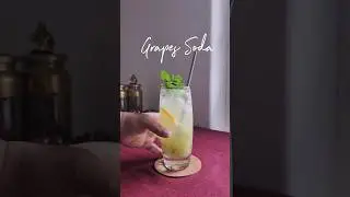 Fizzing delight: A refreshing glass of grapes soda awaits the perfect sip. #drink #refreshingsips
