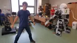 Humanoid robot copying movements of operator