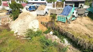 Excellent !! Landfilling using Dump truck unloading soil/Technique operator Bulldozer Working push.