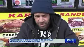 Alleged drunk driver speeds onto sidewalk in Jersey City, nearly hitting man