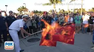 Floridians Mark End Of Tropical Season By Burning Hurricane Flags