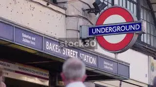 Baker Street Underground Station In London, Entrance Signage With People Passing By, UK