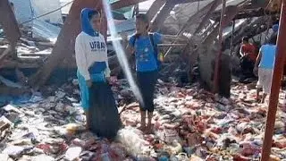 Struggle for survival in Tacloban, Philippine city flattened by Haiyan