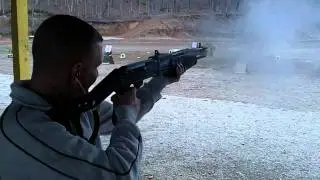 Shotgun Spas-12 semiauto fire.