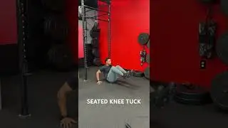 SEATED KNEE TUCK