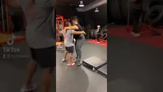 Big woman body slams a man