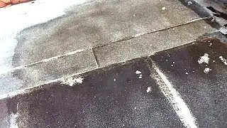 Drain ponding water off a flat roof - quick and cheap