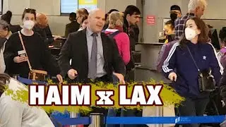 HAIM's Danielle and Alana Haim Take Precautions At LAX