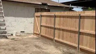 44ft 7ft tall cedar fence with post master and 1 walk gate.