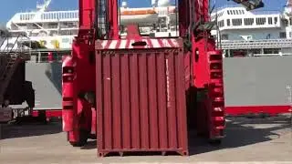 How Cargo Ships are loaded in containers at the seaport. Marine logistics.