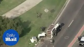 Truck FLIES through the air and flips over during police chase
