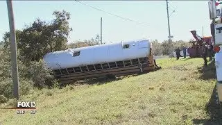 Truck hits school bus in Lake Placid, Florida