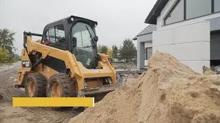 Ładowarki Cat ze sterowaniem burtowym