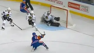Corey Crawford Amazing Glove Save on Taylor Hall in Overtime