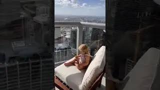 Naomi is playing on the balcony. Cute Baby video!