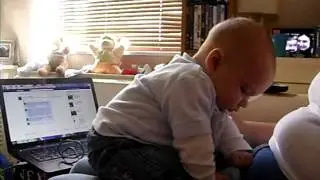 Munchkin sitting unaided