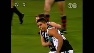 Young Peter Burgoyne kicking a silk goal in his first AFL season (1997)