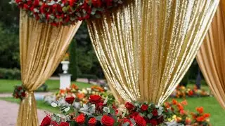 Mandap with gold sequin fabric & red rose garland wedding decor