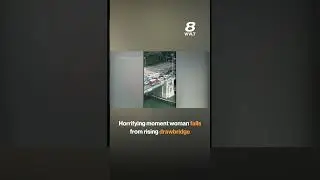Horrifying moment woman falls from rising drawbridge