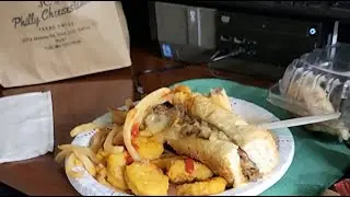 PHILLY CHEESES STEAK CHICKEN NUGGETS AND A SPRITE.