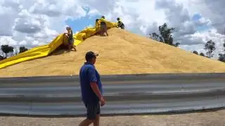 Putting a Tarp over a Grain Ring Bunker