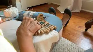 First steps of bobbin lace making: cloth stitch with thread too big for the pattern; aha!