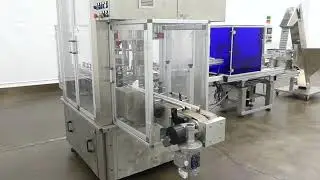 E20315 - Rejves Four Station Snap Capper with Elevating Conveyor and Unscrambler