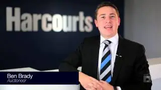 Harcourts Queensland Chief Auctioneer Ben Brady