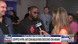 Floyd Mayweather wearing EMAX tshirt